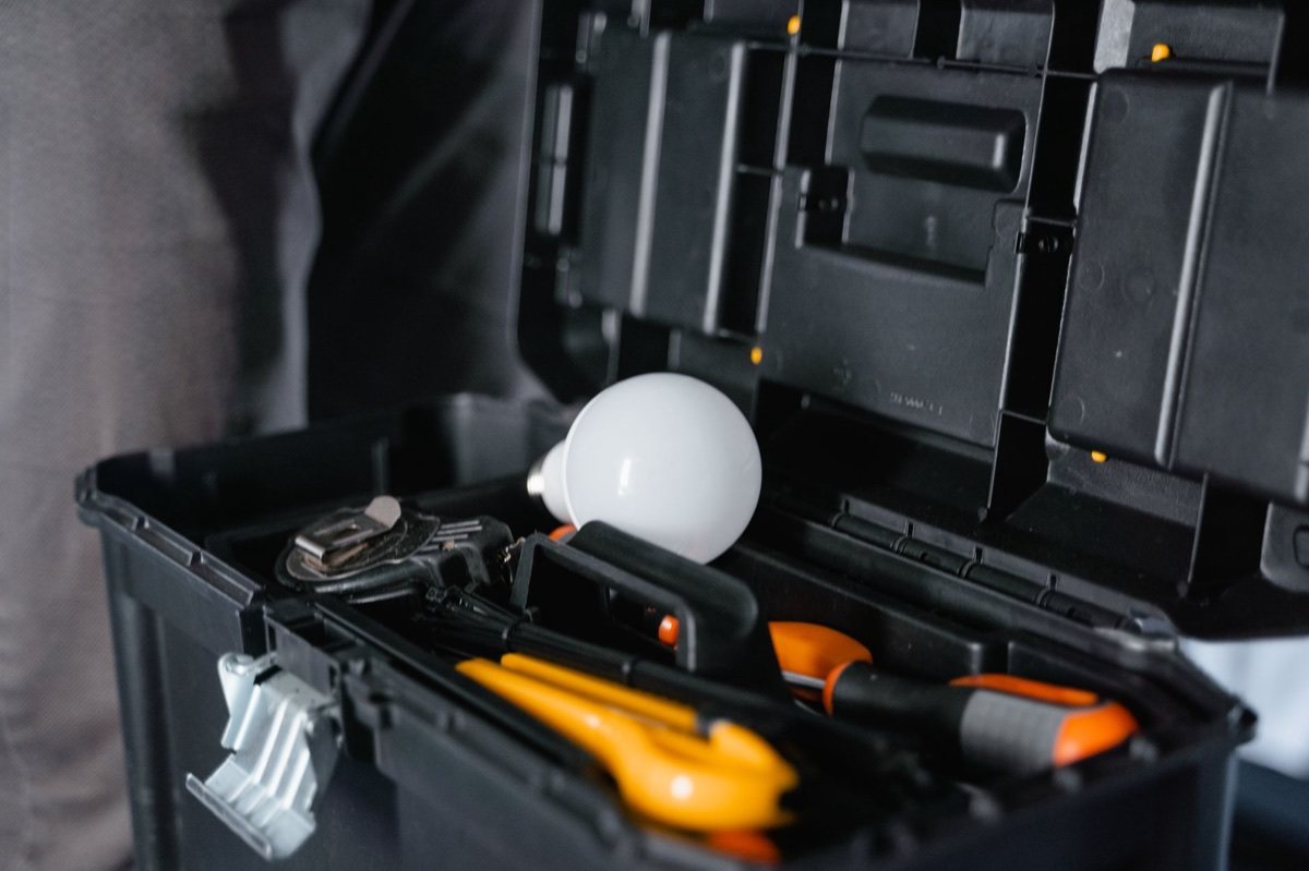 Appliance repair technician at work